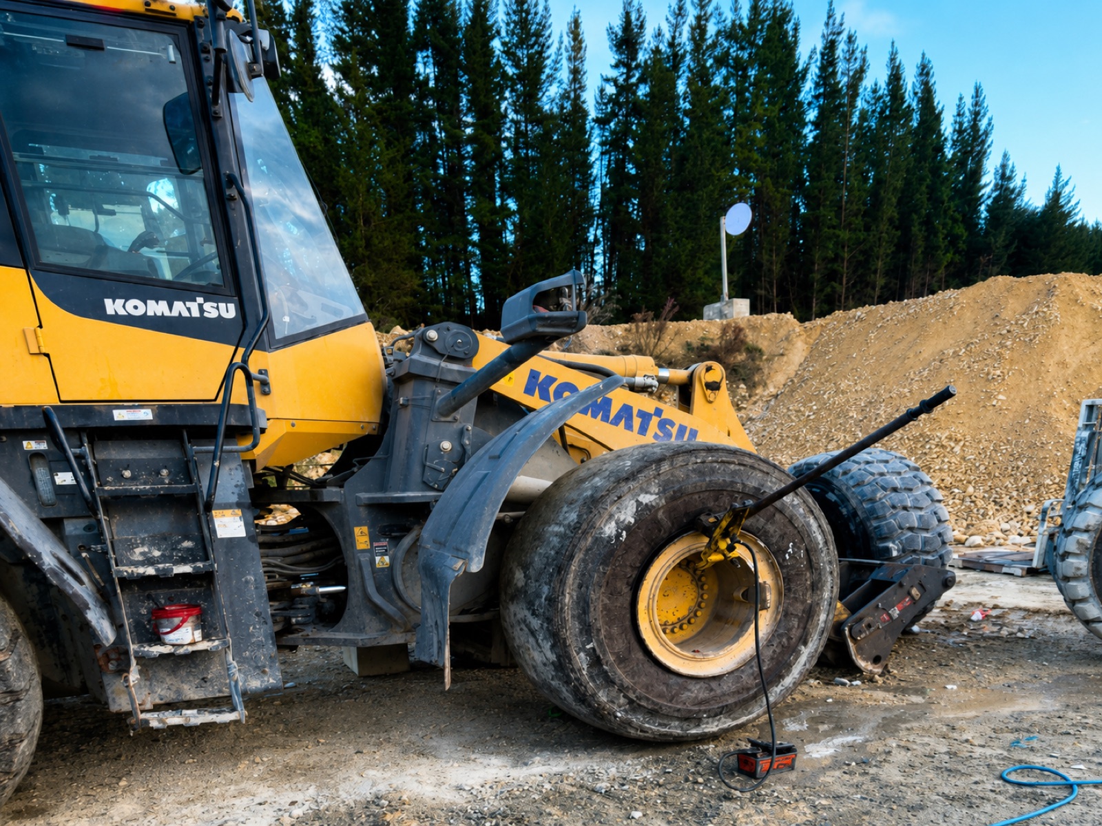 Komatsu loader tyre change in the forest yard